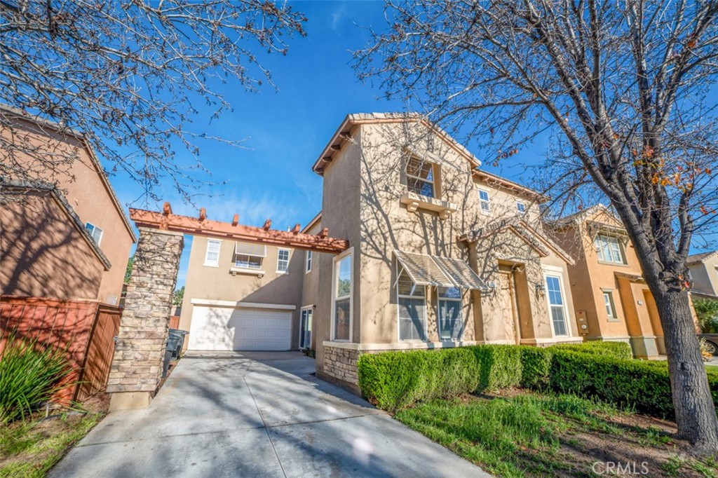 3653 Alhambra Lane Perris, CA 92571 - Photo 1 of 1 front view of a house with a street