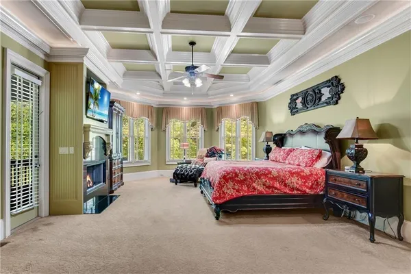 a bedroom with bed and window