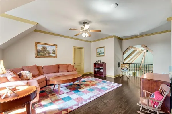 a living room with furniture and a table