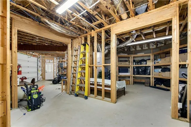 a balcony with wooden floor outdoor seating and furniture