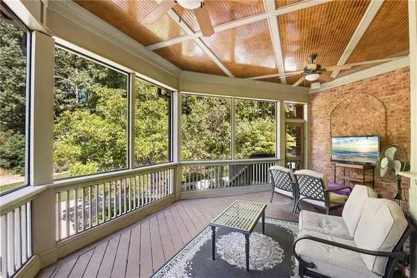 an aerial view of a house with yard swimming pool and outdoor seating