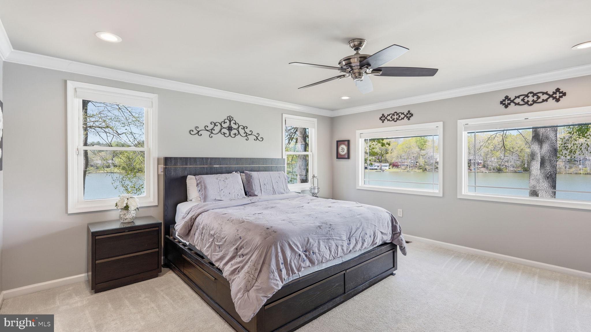 5 Jason Circle Ruther Glen, VA 22546 - Photo 19 of 40 Huge primary bedroom with waterfront views