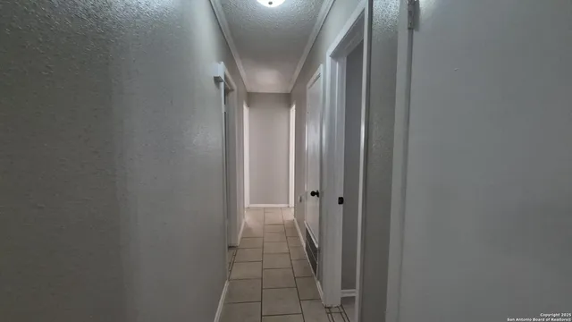 a view of hallway with stairs