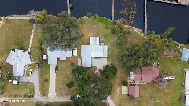 a bathroom with a sink vanity and mirror
