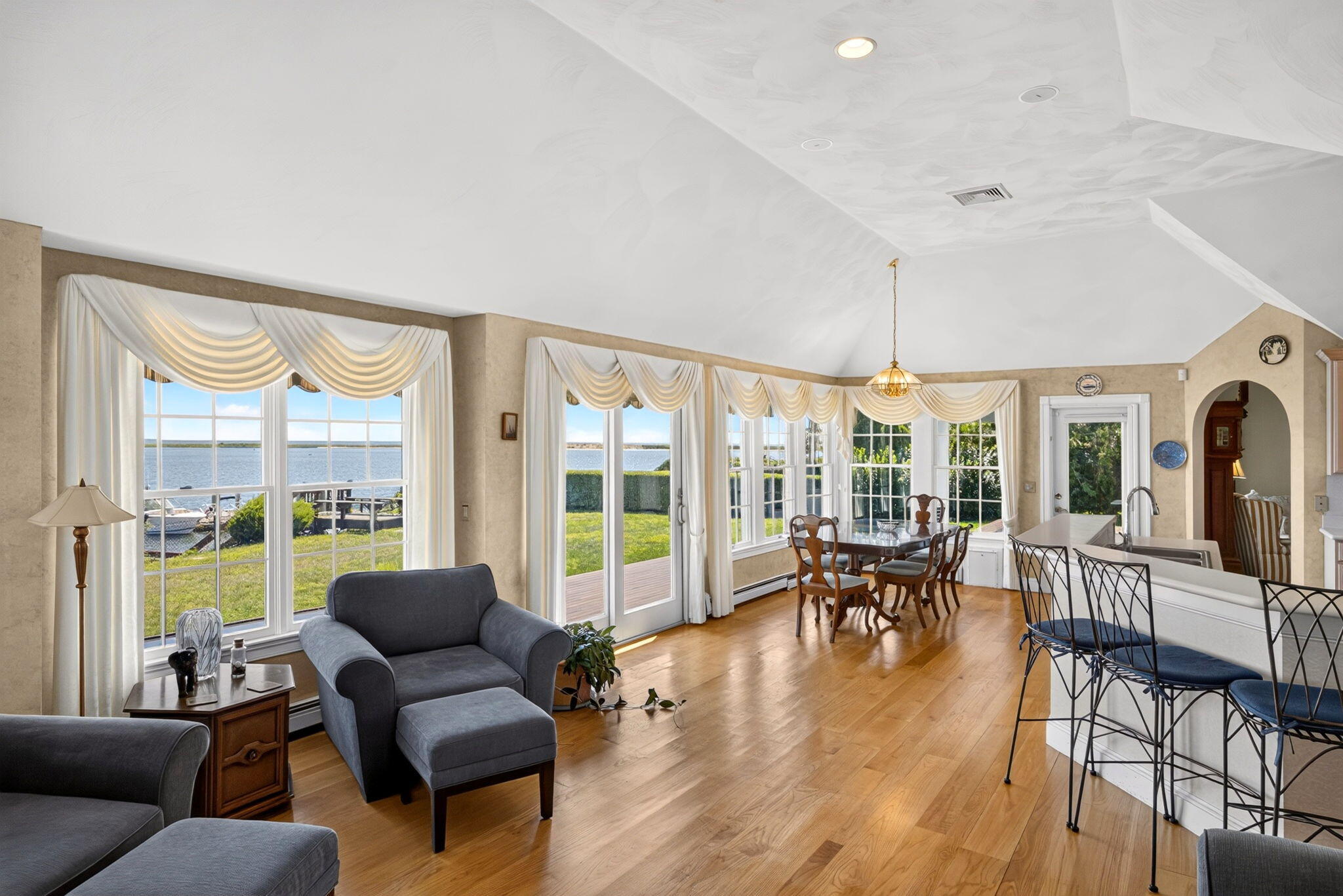 50 Popponesset Island Road Mashpee, MA 02649 - Photo 15 of 41 Family Room and Kitchen