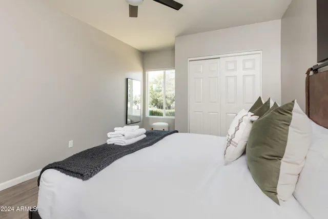 a en suite bathroom with a sink and mirror
