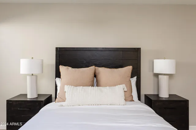 a view of a dining room with furniture and window