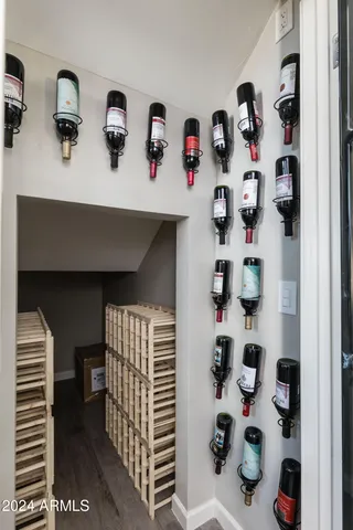a view of room with cabinets and book shelf