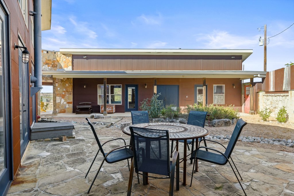 1292 Upper Turtle Creek Road Kerrville, TX 78028 - Photo 22 of 40 View of patio featuring outdoor dining space
