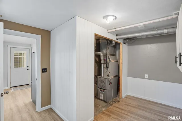 wooden floor and closet in a room