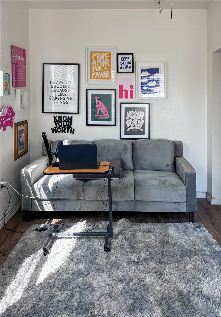 4301 Arlington Avenue Los Angeles, CA 90008 - Photo 13 of 18 a living room with furniture and a couch