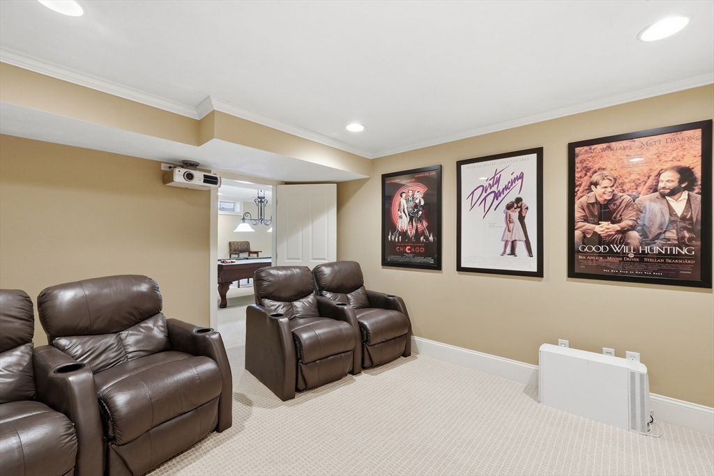 22 McNeil Circle, Unit 22 Hopkinton, MA 01748 - Photo 37 of 42 a living room with furniture and a couch