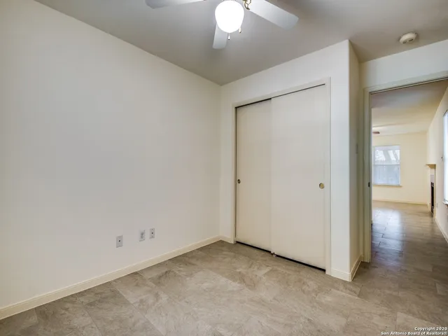 an empty room with a bathroom