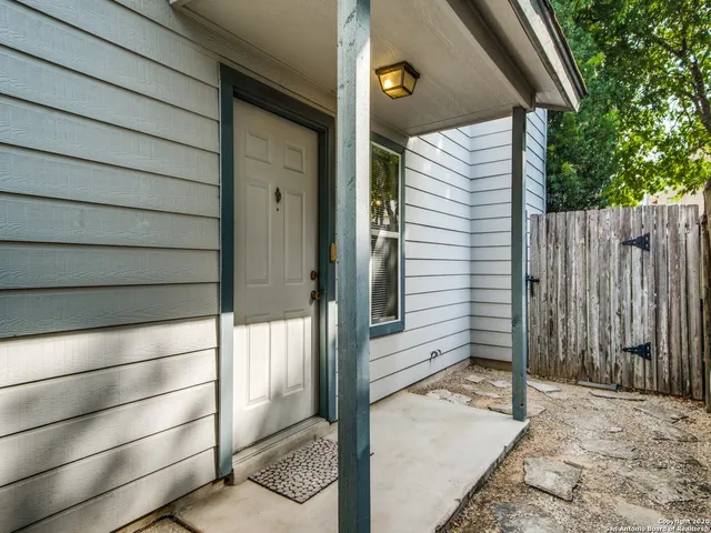 a view of a wooden door of a house