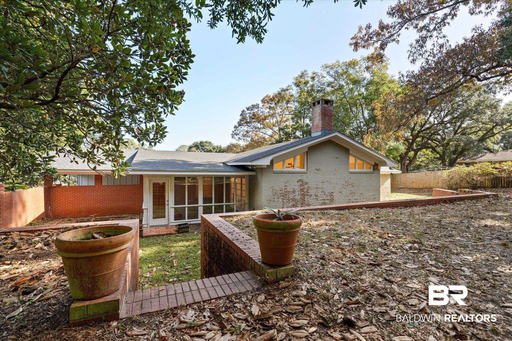 3807 Hillcrest Lane Mobile, AL 36693 - Photo 27 of 28 Tiered and Treed Back Yard