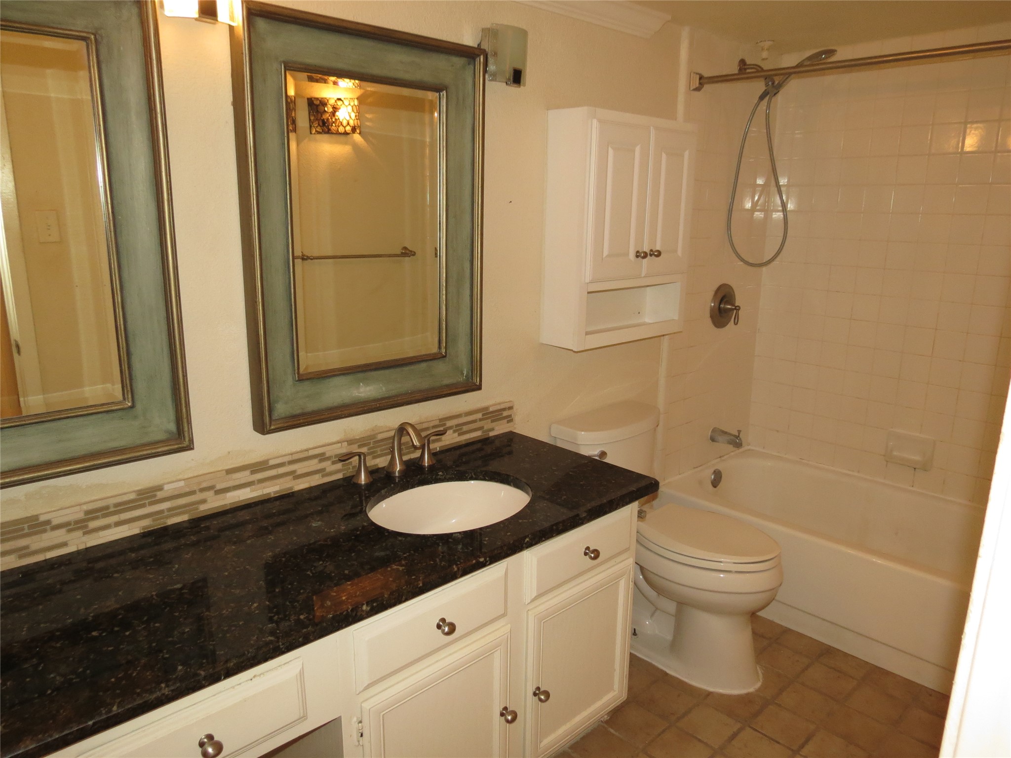 4159 Steck Avenue, Unit 269 Austin, TX 78759 - Photo 14 of 21 Granite counters and dual framed mirrors elevate this comfortable primary bathroom space.
