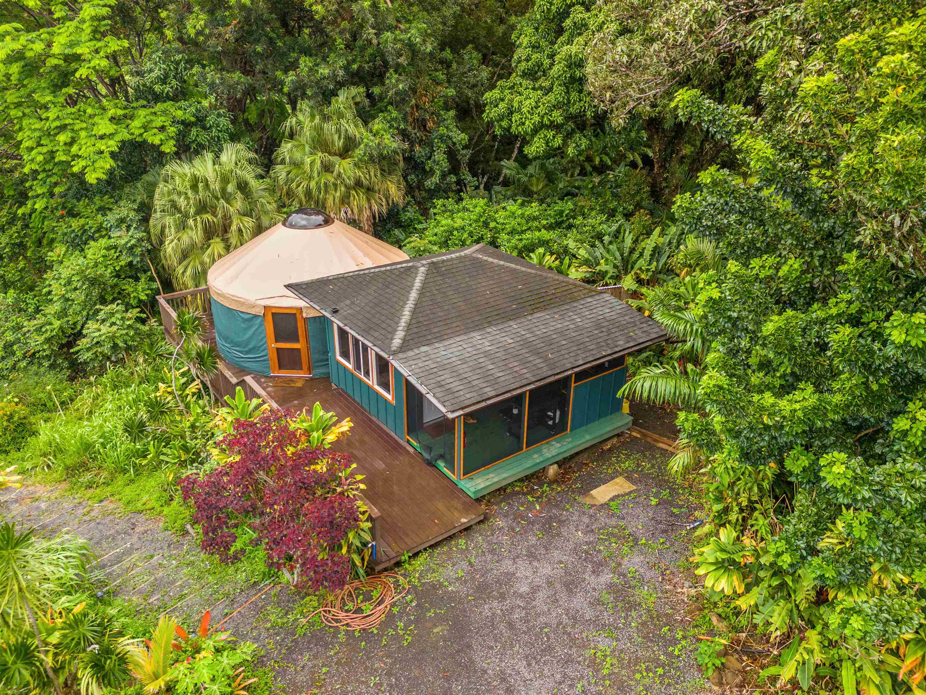 44 Hanauana Road Haiku, HI 96708 - Photo 11 of 45 an aerial view of a house with a yard
