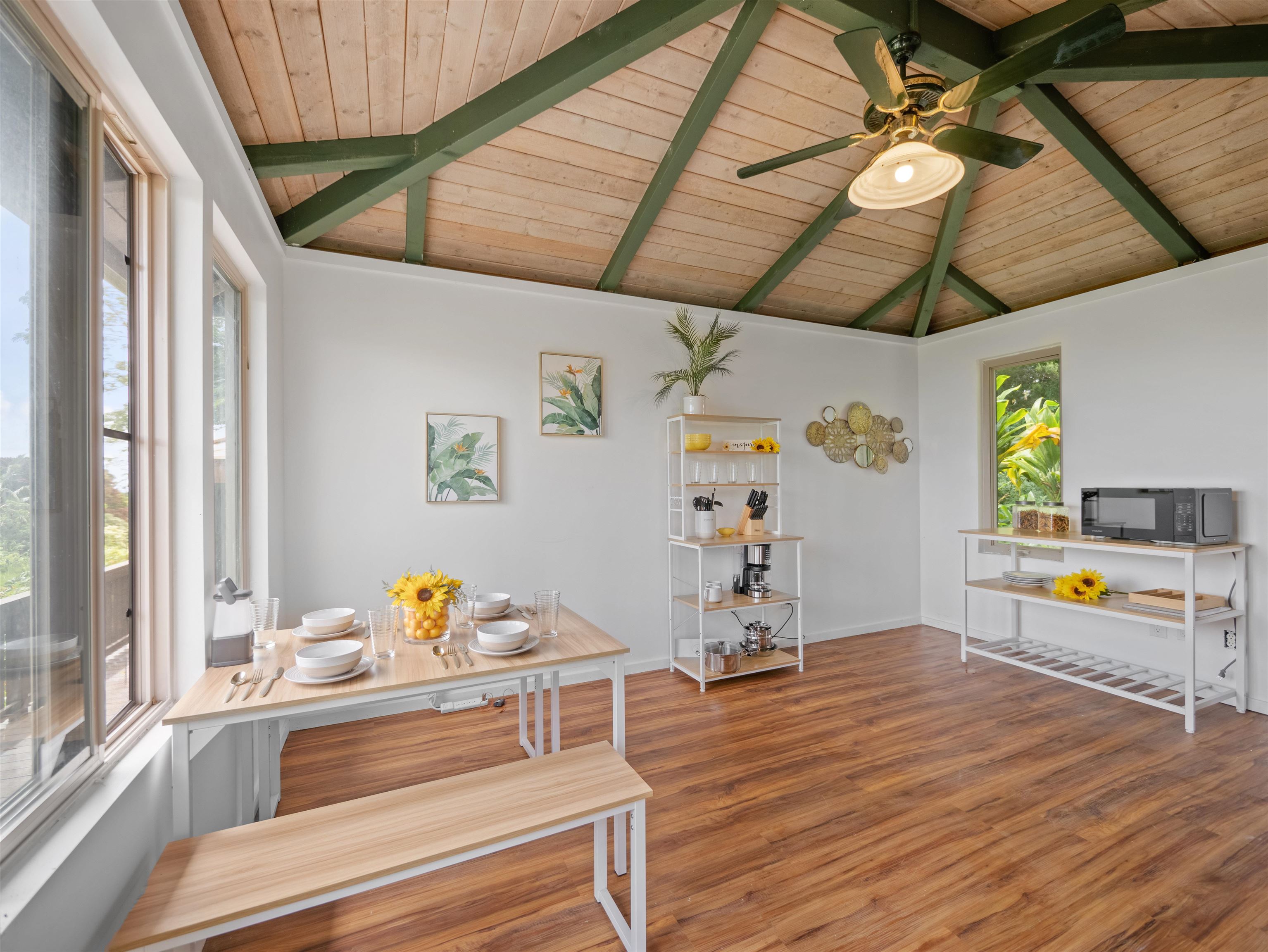 44 Hanauana Road Haiku, HI 96708 - Photo 15 of 45 a living room with furniture and a wooden floor
