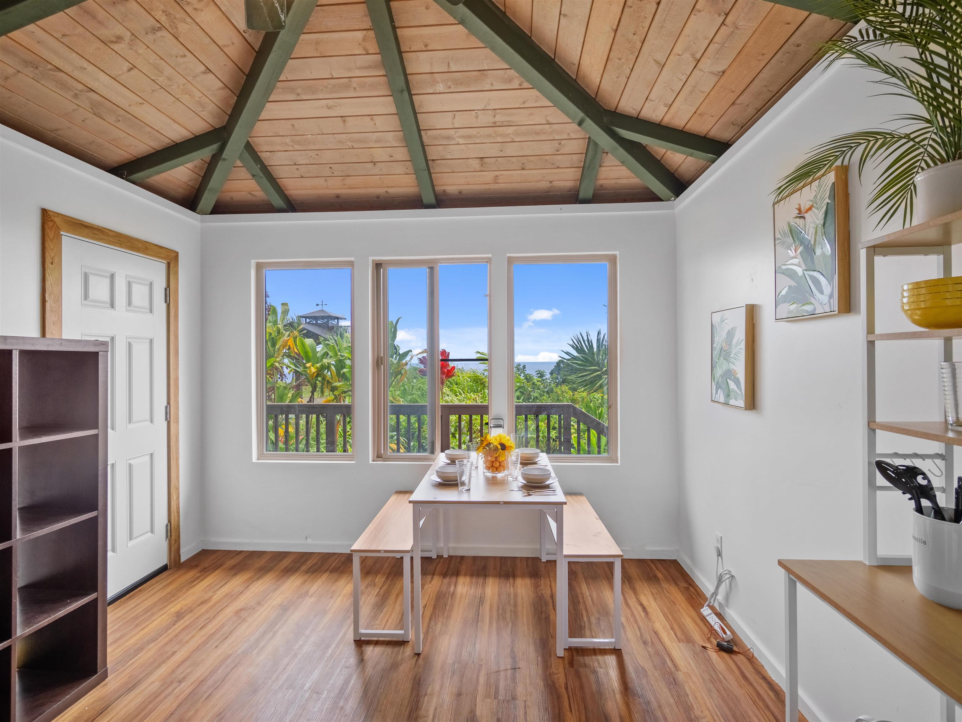 44 Hanauana Road Haiku, HI 96708 - Photo 17 of 45 a sitting area with wooden floors and pool table