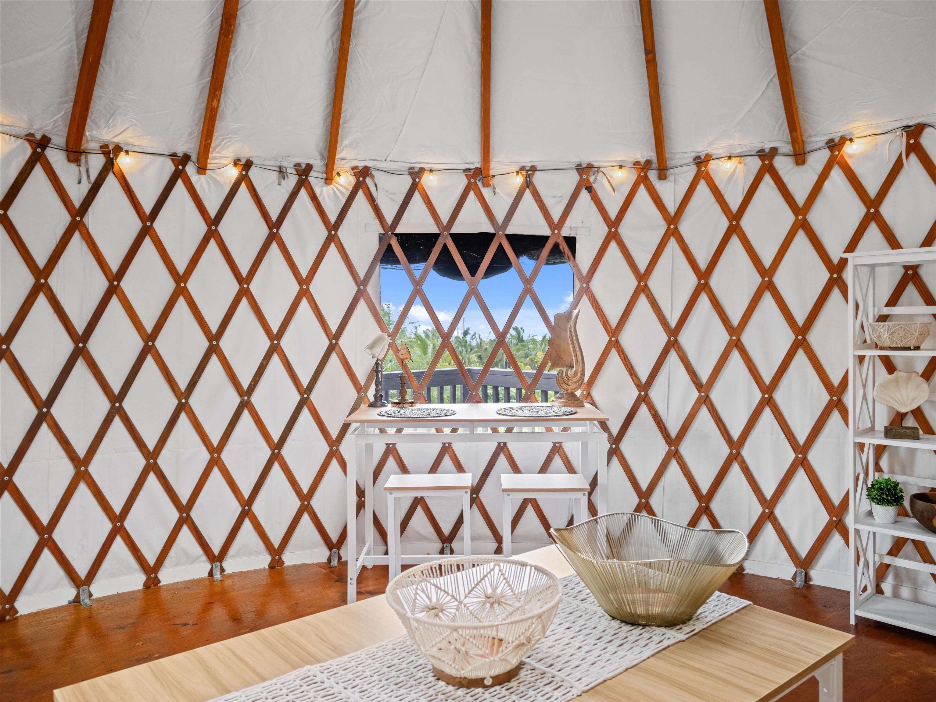 44 Hanauana Road Haiku, HI 96708 - Photo 20 of 45 a table and a vase with of flowers sitting on a table