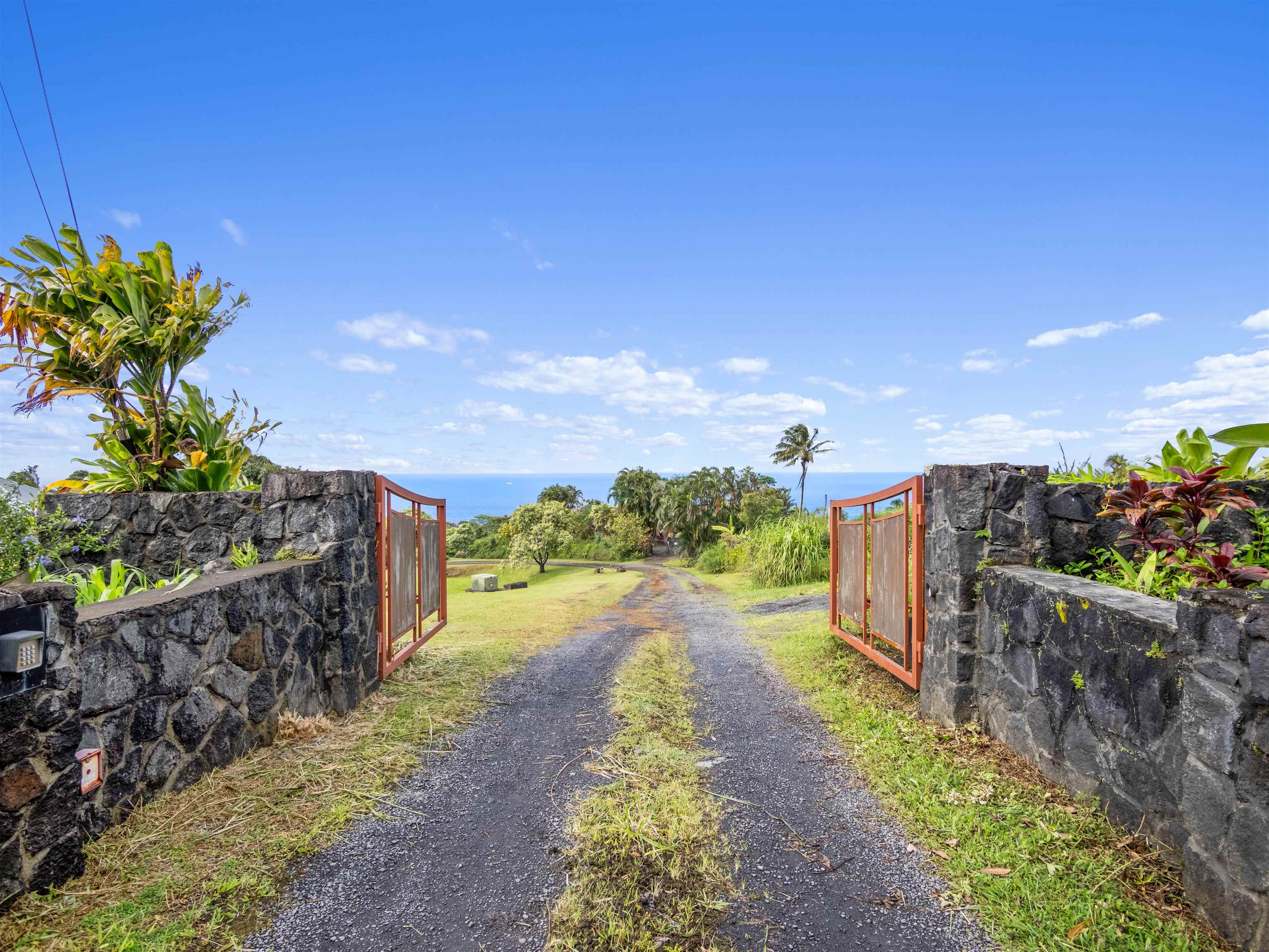 44 Hanauana Road Haiku, HI 96708 - Photo 2 of 45 a view of a pathway with a garden