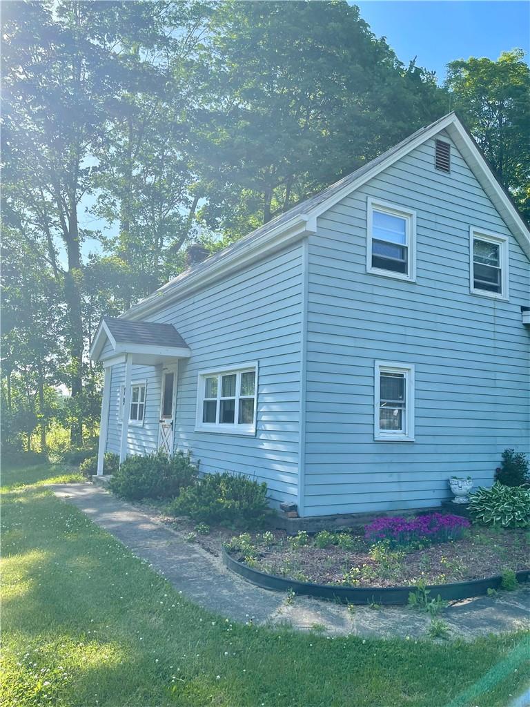 79 Chelsea Road Wappingers Falls, NY 12590 - Photo 1 of 1 View of home's exterior featuring a yard