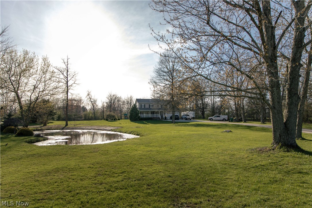 4750 Turney Road Madison, OH 44057 - Photo 3 of 42 View of yard with a water view