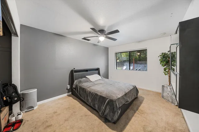 a view of storage and utility room with washer and dryer