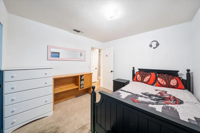 an aerial view of lake and residential houses