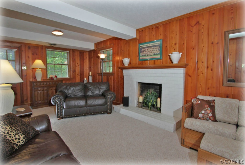 13321 Kingsmill Road Midlothian, VA 23113 - Photo 11 of 14 a living room with furniture and a fireplace