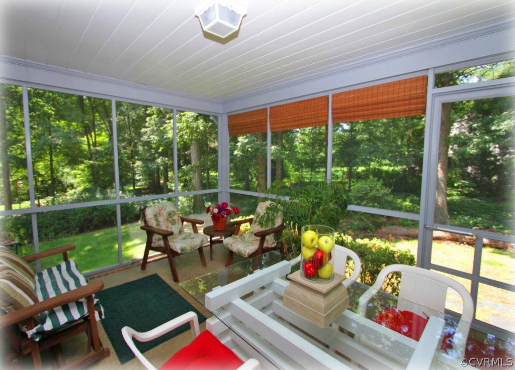 13321 Kingsmill Road Midlothian, VA 23113 - Photo 13 of 14 a living room filled with furniture and garden view