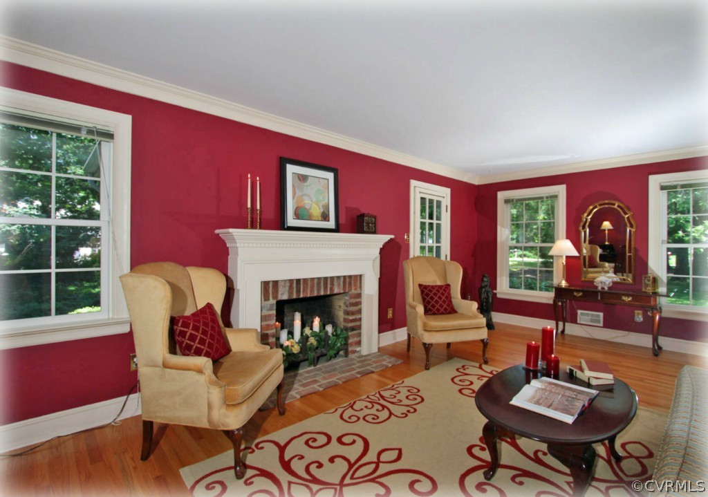 13321 Kingsmill Road Midlothian, VA 23113 - Photo 2 of 14 a living room with furniture fireplace and dining table