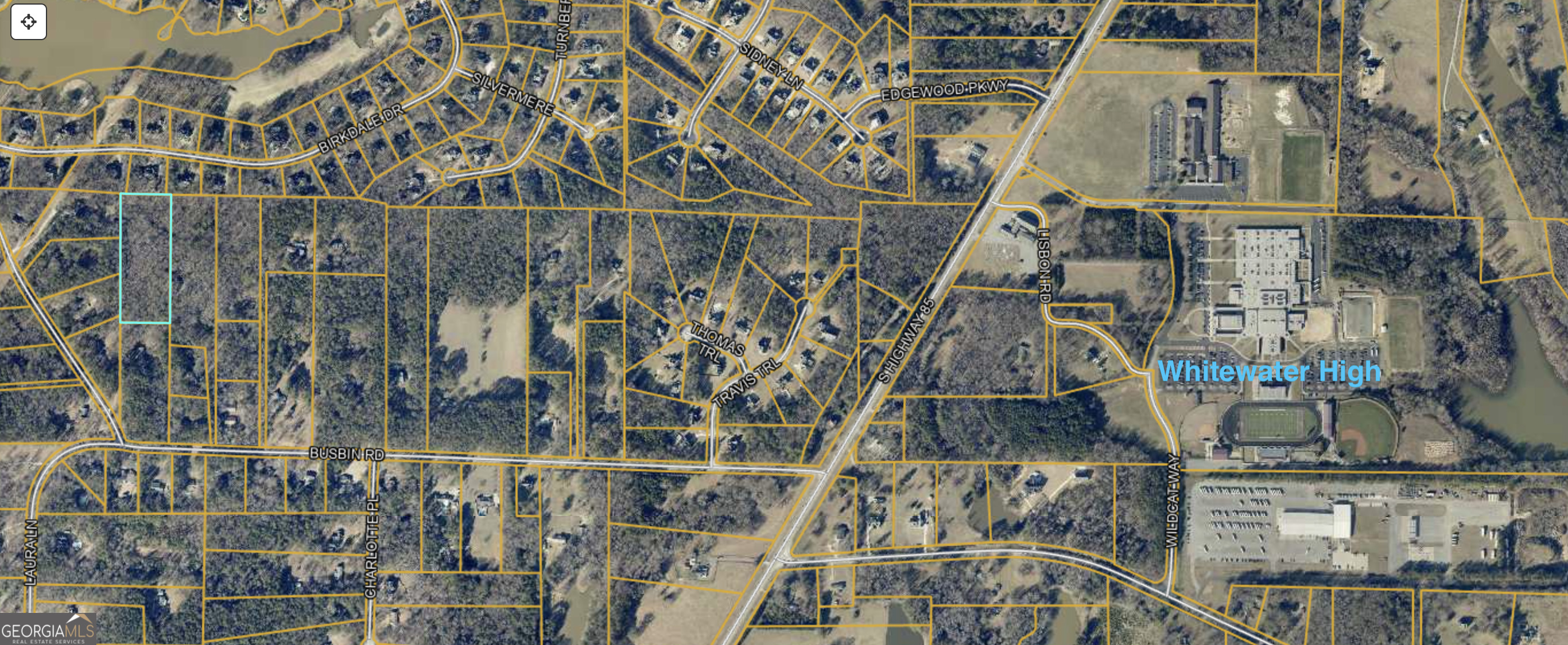 0 Busbin Road Fayetteville, GA 30215 - Photo 7 of 8 a view of building with an outdoor space