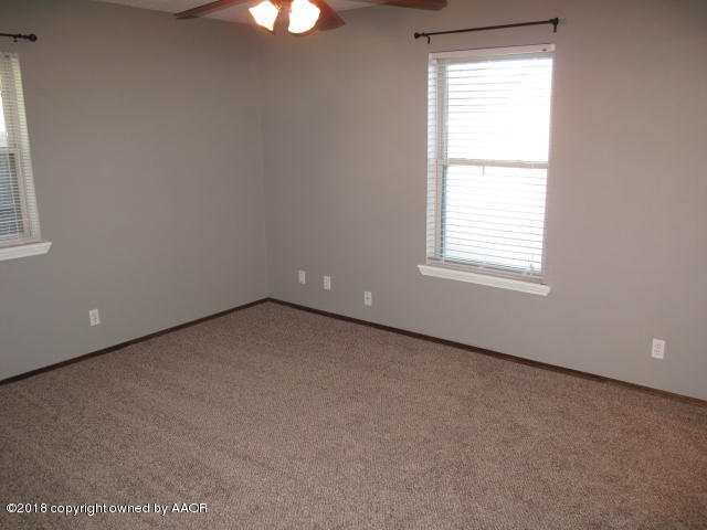 8108 Goodnight Trail Amarillo, TX 79110 - Photo 9 of 17 an empty room with a window