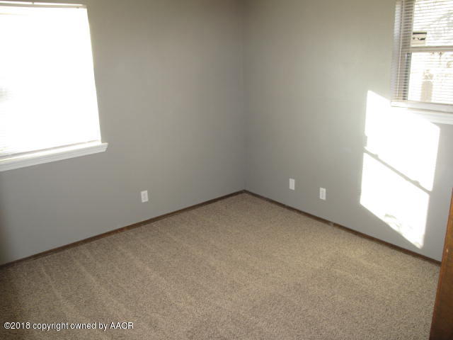 8108 Goodnight Trail Amarillo, TX 79110 - Photo 10 of 17 an empty room with a window