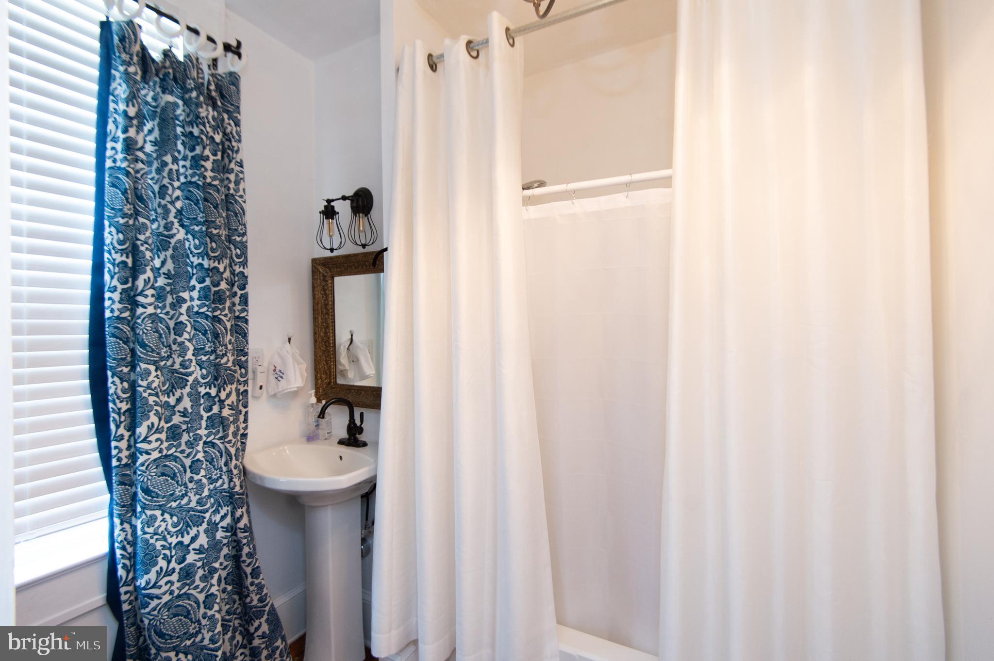 1 West End Avenue Cambridge, MD 21613 - Photo 15 of 33 a bathroom with a sink toilet and shower