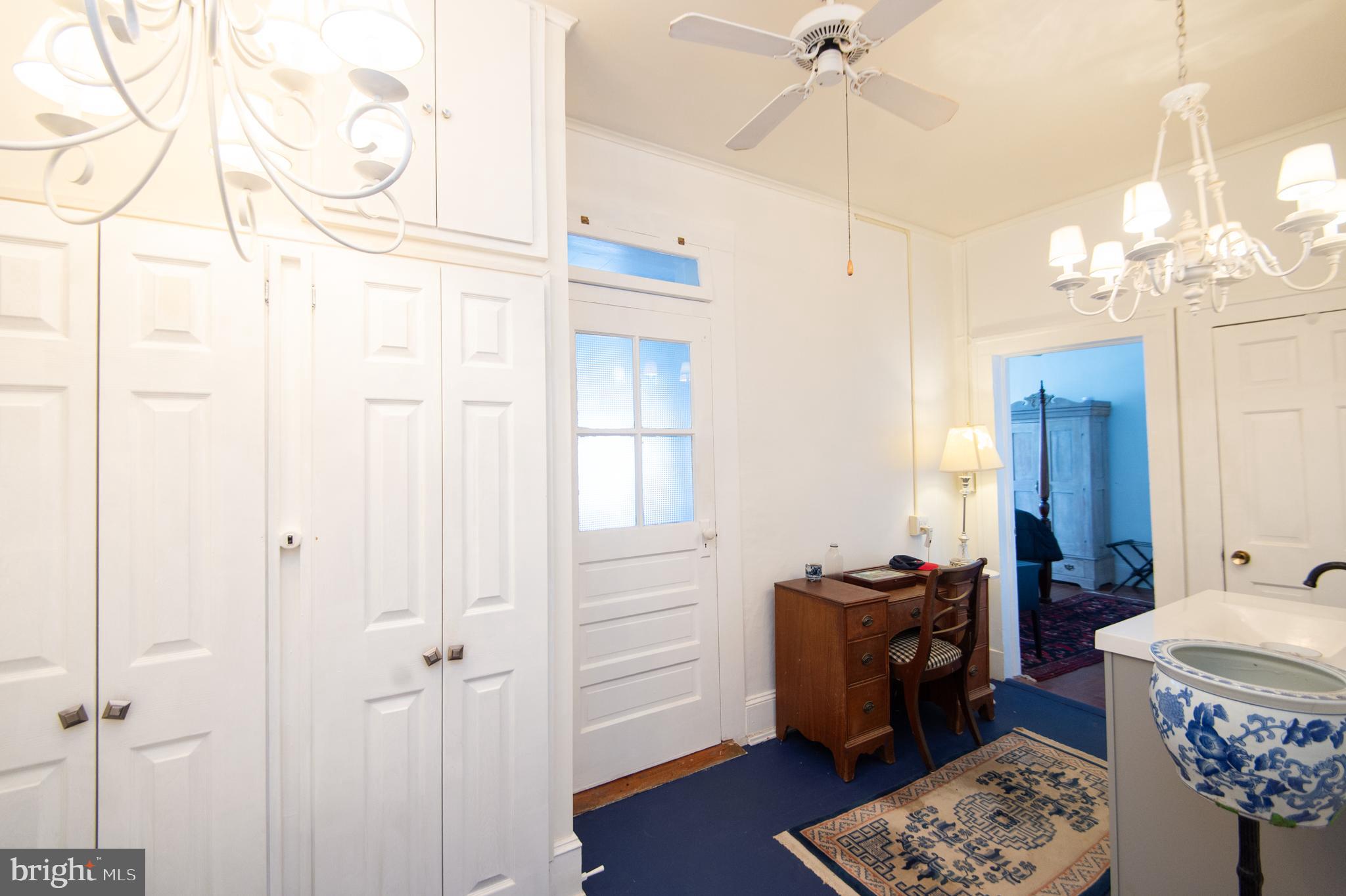 1 West End Avenue Cambridge, MD 21613 - Photo 20 of 33 a room with table and chairs