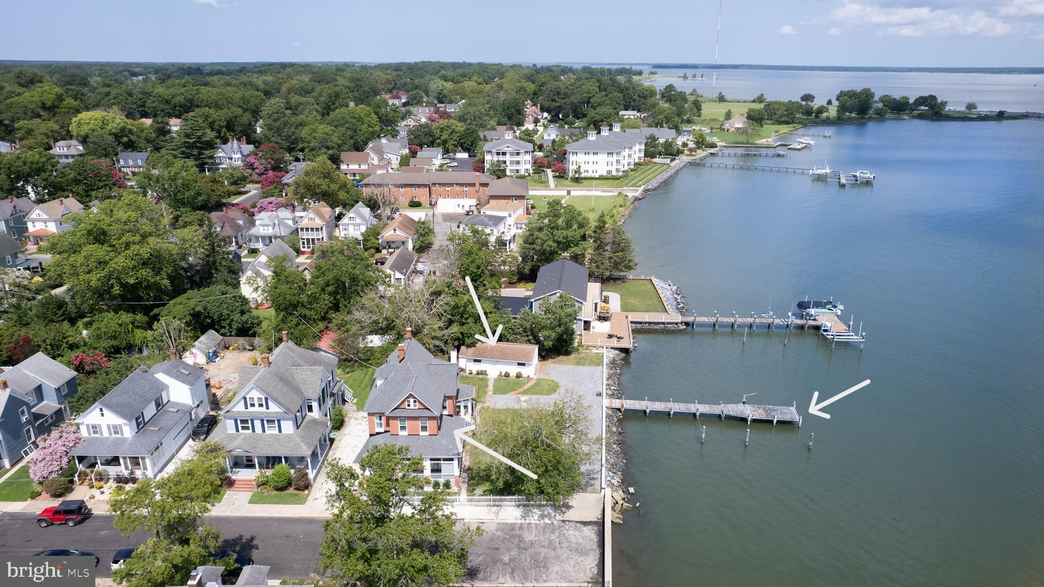 1 West End Avenue Cambridge, MD 21613 - Photo 26 of 33 an aerial view of residential houses with outdoor space and river