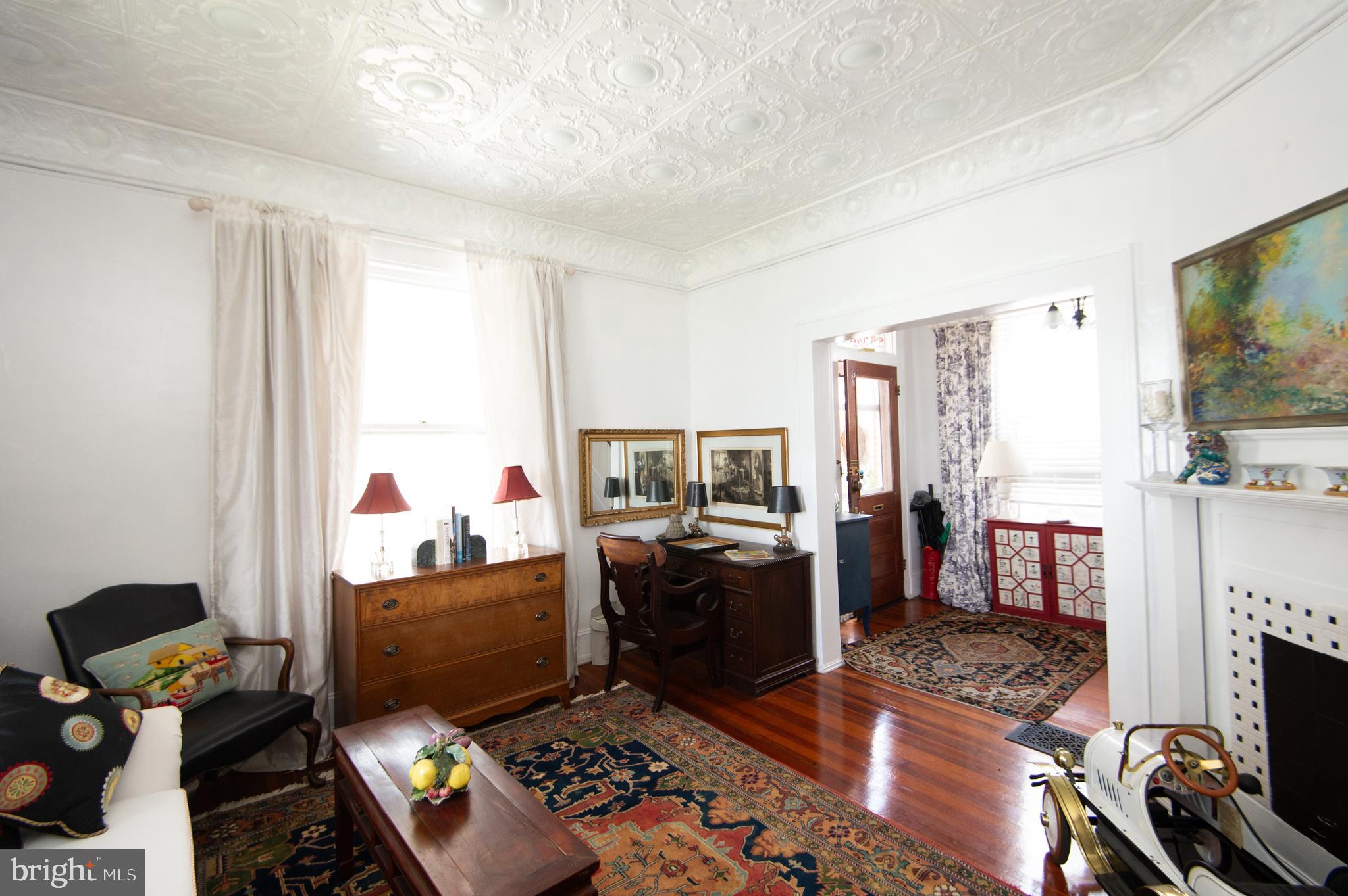 1 West End Avenue Cambridge, MD 21613 - Photo 6 of 33 a living room with furniture and a flat screen tv