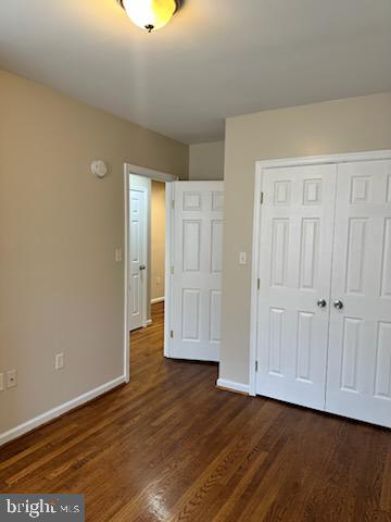 1913 Rosedale Street Northeast, Unit 1 Washington, DC 20002 - Photo 3 of 12 a view of an empty room with wooden floor