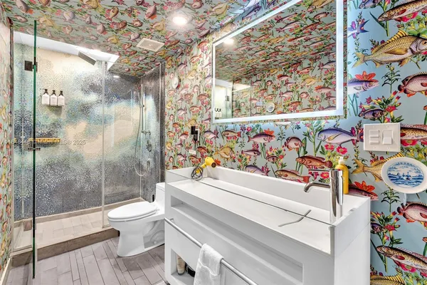 a dining room with furniture and wooden floor