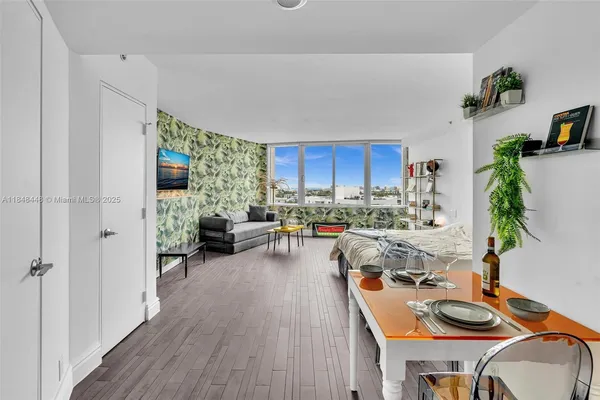 a bed room with a bed and a couch