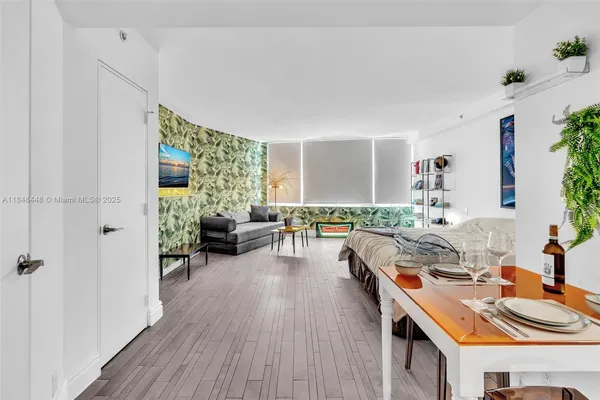 a view of a chairs and table in a patio