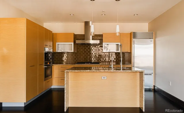 a view of a kitchen with a window