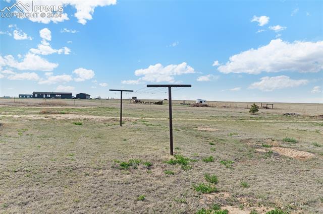 33510 Fossinger Road Yoder, CO 80864 - Photo 38 of 50 View of yard with a rural view