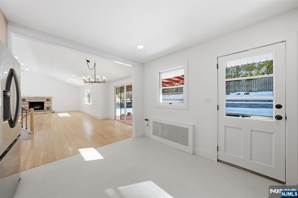 40 Magnolia Avenue Tenafly, NJ 07670 - Photo 17 of 48 a view of a kitchen with wooden floor and a sink