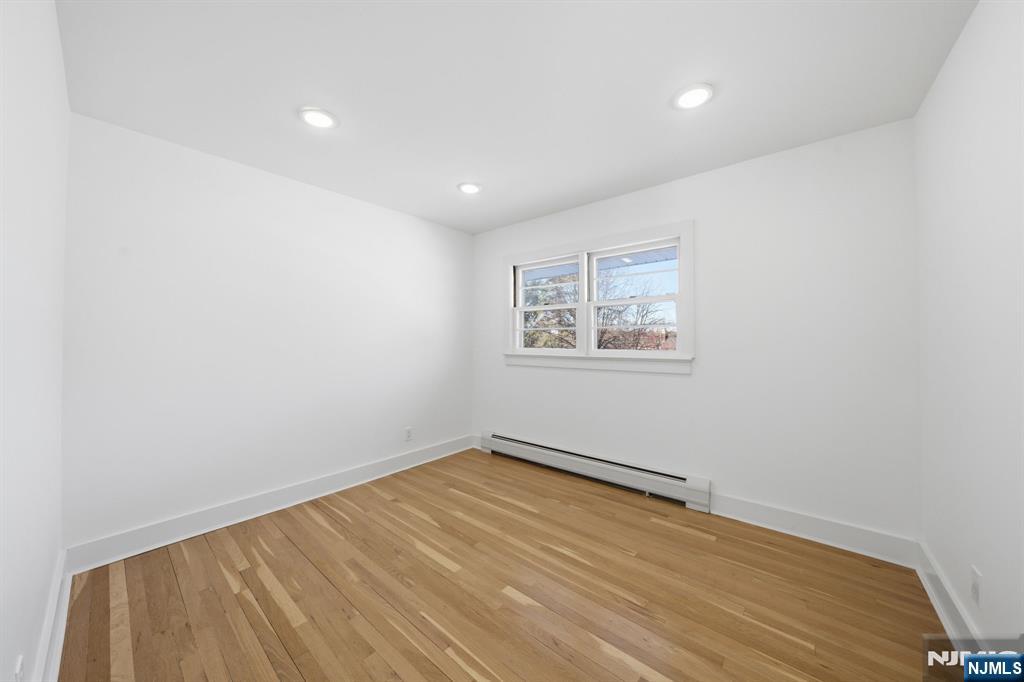 40 Magnolia Avenue Tenafly, NJ 07670 - Photo 27 of 48 a view of empty room with wooden floor