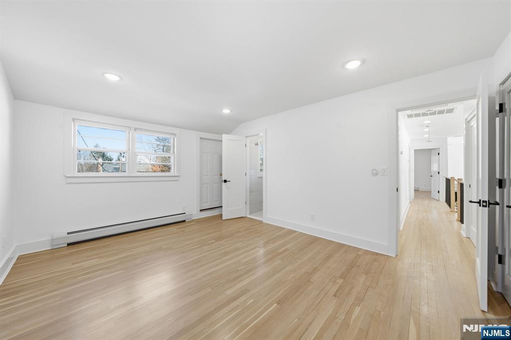 40 Magnolia Avenue Tenafly, NJ 07670 - Photo 32 of 48 a view of empty room with wooden floor