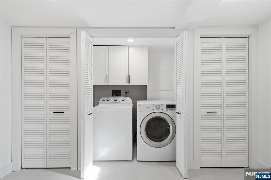 40 Magnolia Avenue Tenafly, NJ 07670 - Photo 37 of 48 a utility room with dryer and washer