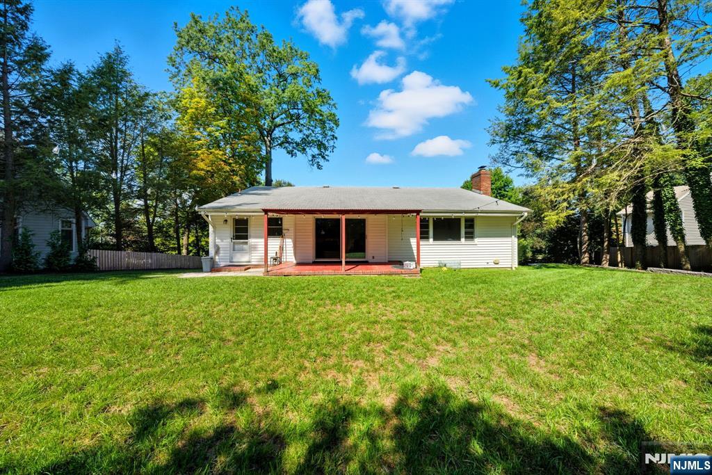 40 Magnolia Avenue Tenafly, NJ 07670 - Photo 45 of 48 a view of a house with backyard and garden